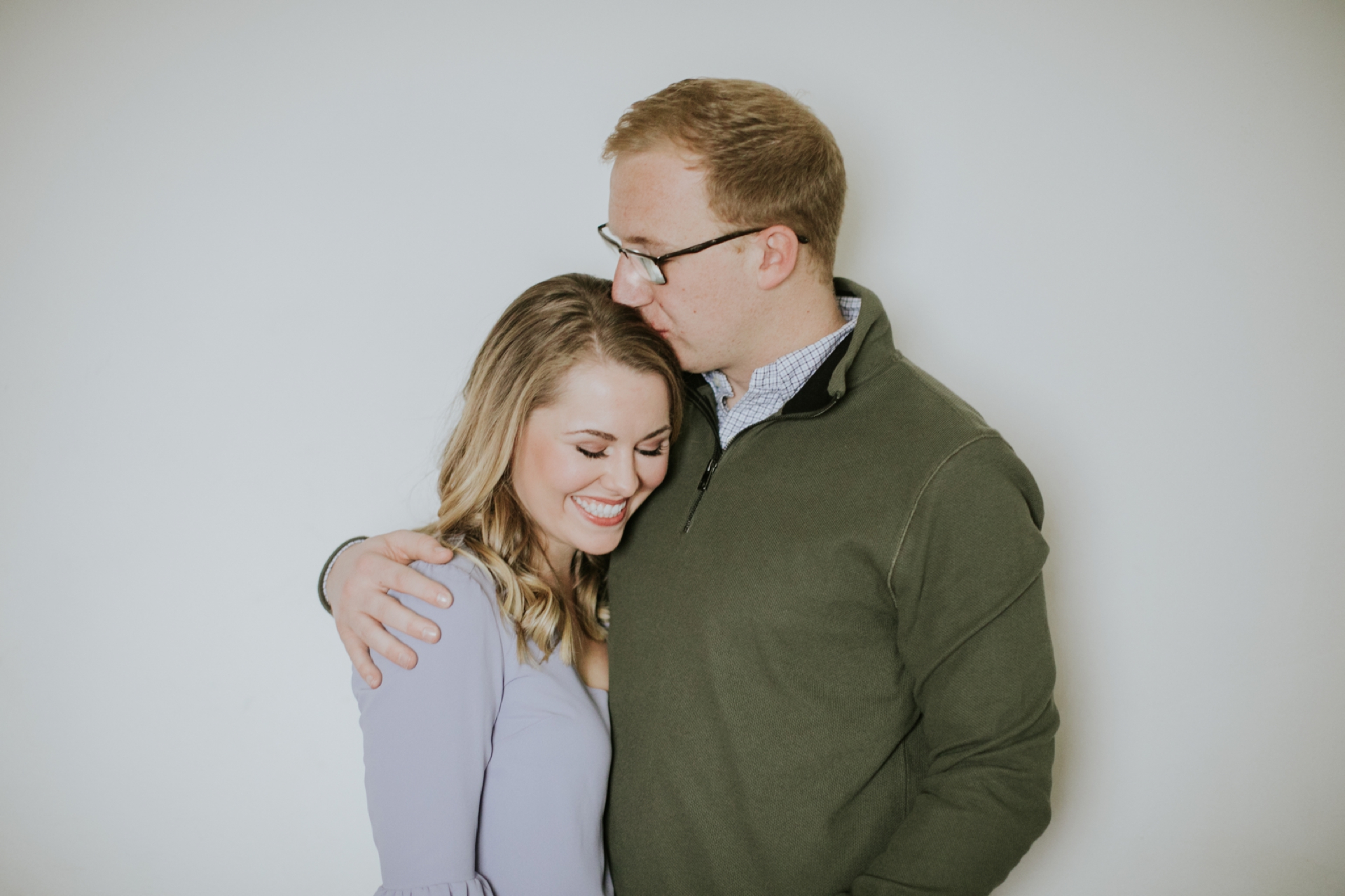 Engagement Photo Session Blonde Couple White Wall Athenaeum Theater Indy