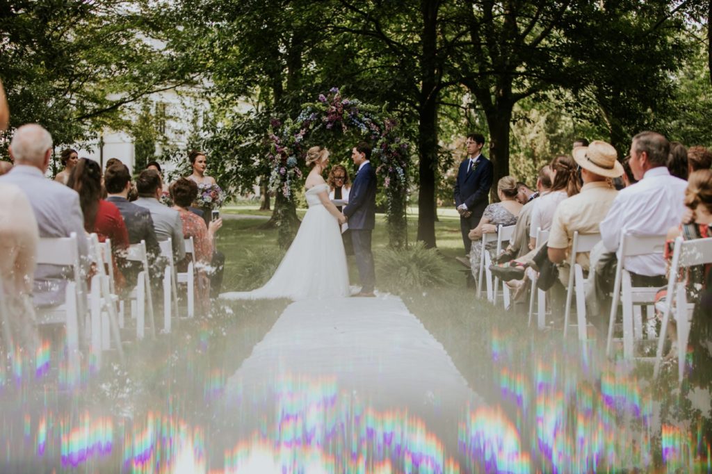 prisming photo of bride and groom at newfields during ceremony for their IMA wedding