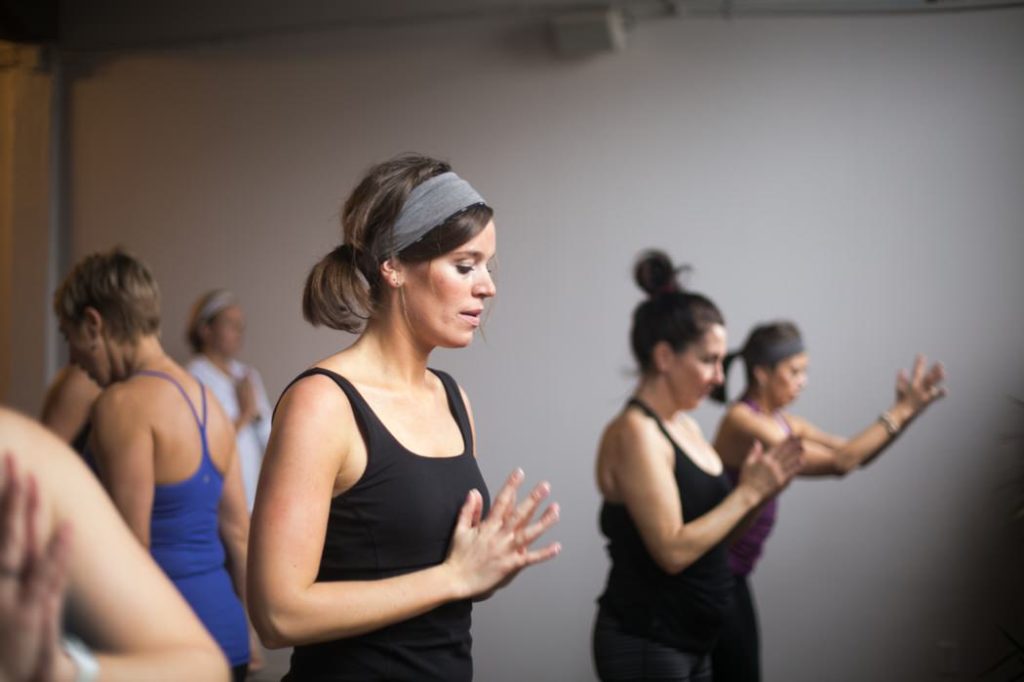 woman clasping hands during an Indianapolis Yoga Photography shoot