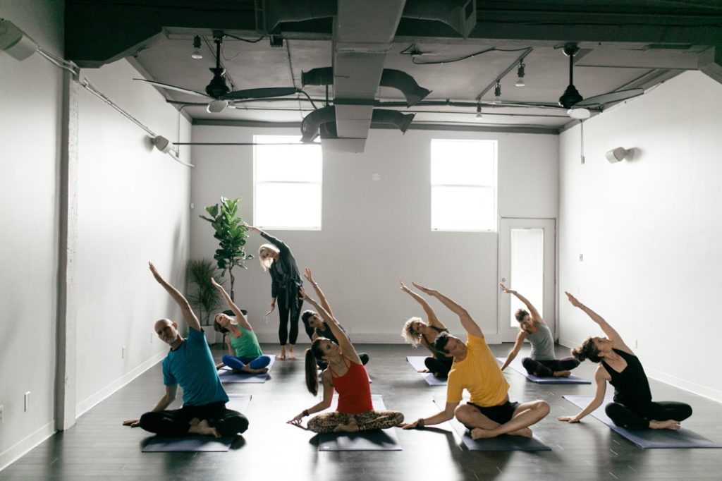 people stretch their bodies during an Indianapolis Yoga Photography shoot