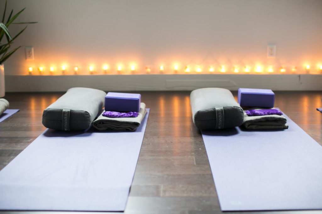 candles and yoga mats up close