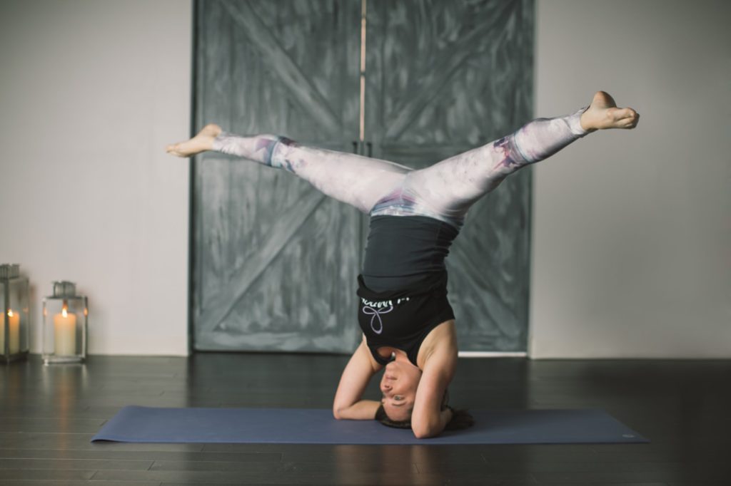 woman in blank tanktop does head stand during Indianapolis Yoga Photography shoot