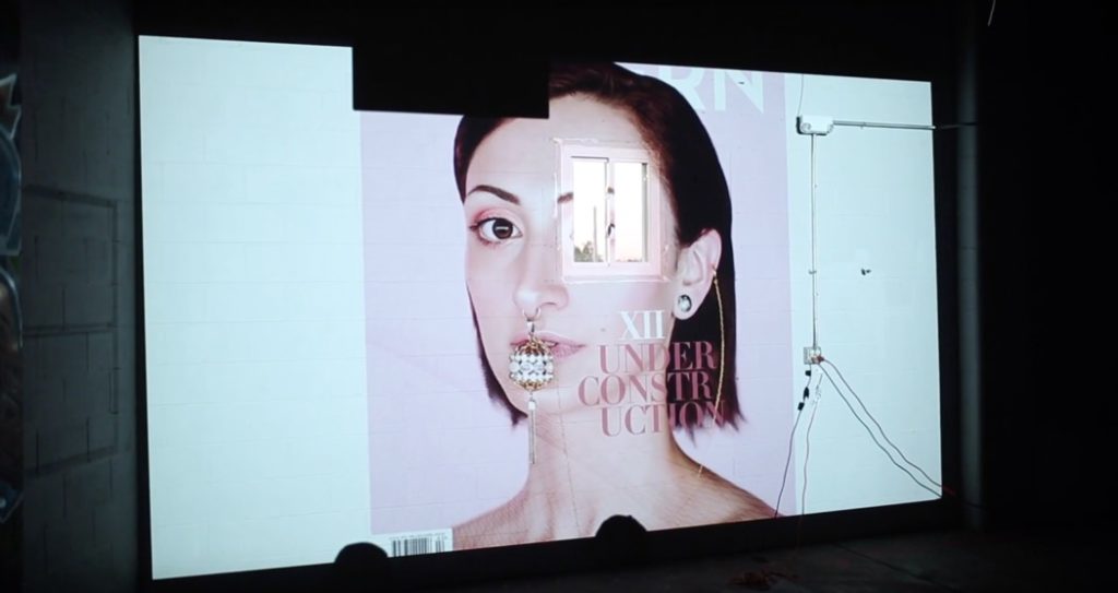 cover photo from issue 12 of pattern magazine projected on a wall during launch party
