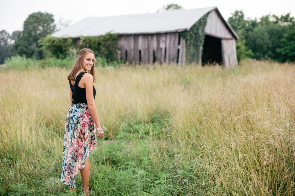 girl in front of dilapidated barn in Delaware County Portraits