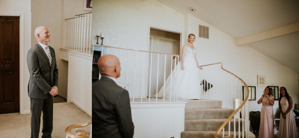 bride walks down stairs and father sees her for the first time for muncie wedding photography
