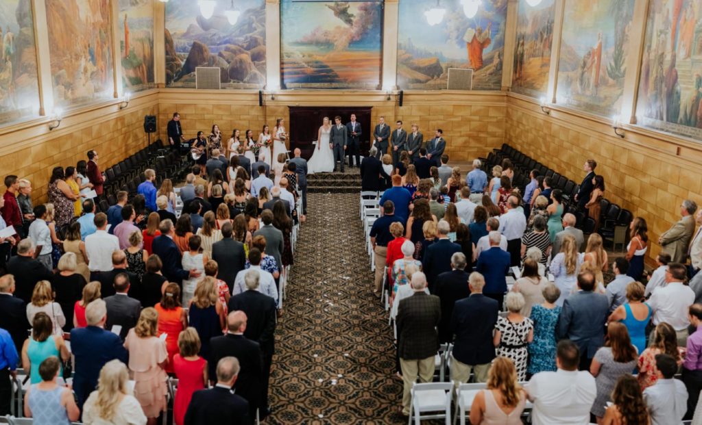 wide shot of guests attending wedding at cornerstone center for the arts