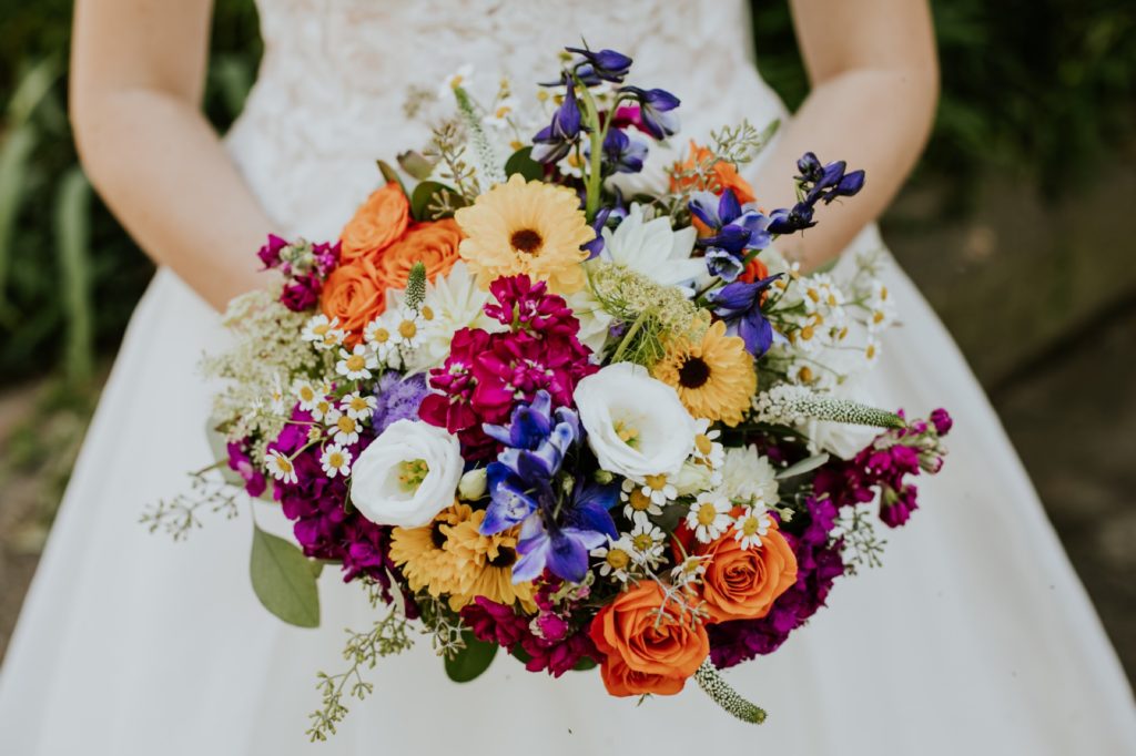 bride's bouquet of flowers held in her hands