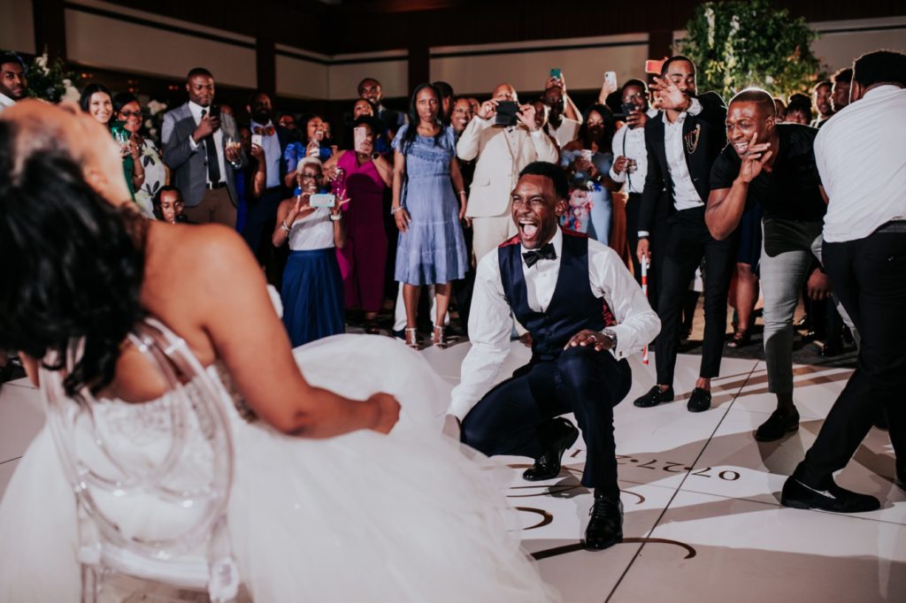 groom dancing for bride during newfields wedding photography