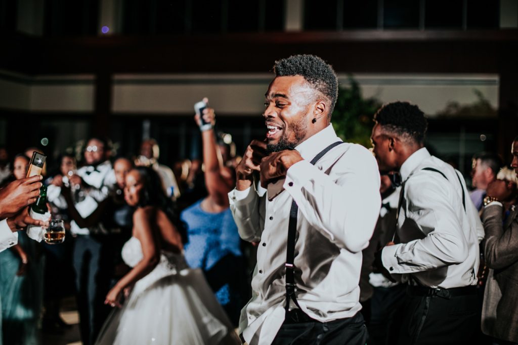 man dances during open dancing during newfields wedding photography
