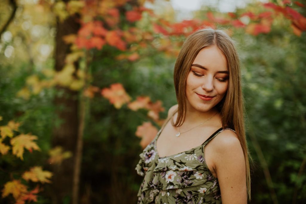 girl in floral tank top in autumn in Pendleton Senior Portraits