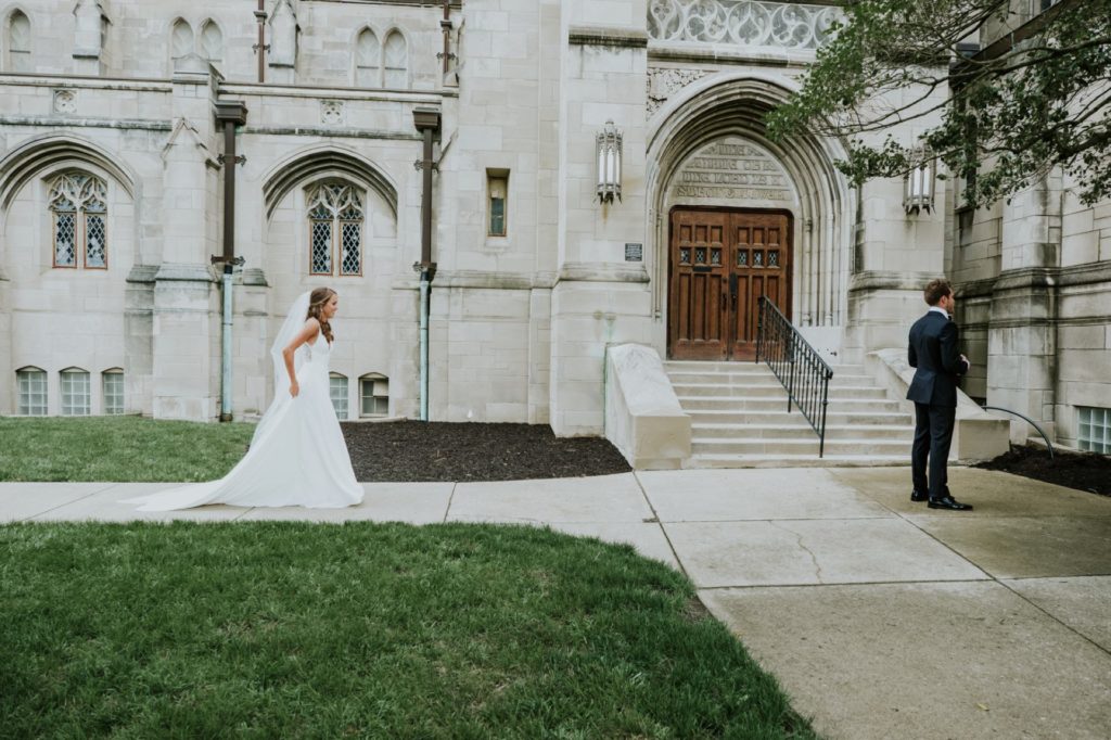 bride and groom first look at tabernacle presbyterian wedding photography