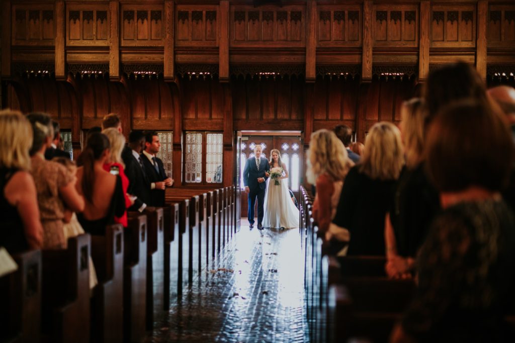 bride and father of bride walking down the aisle at tabernacle presbyterian wedding photography