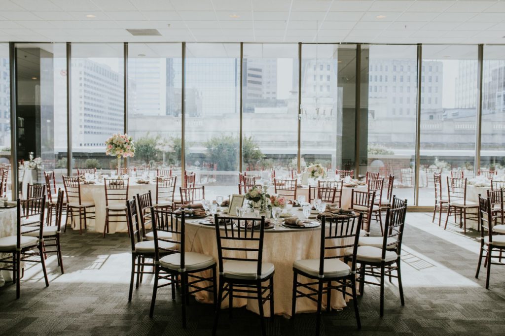 tables and chairs set up for wedding at regions tower