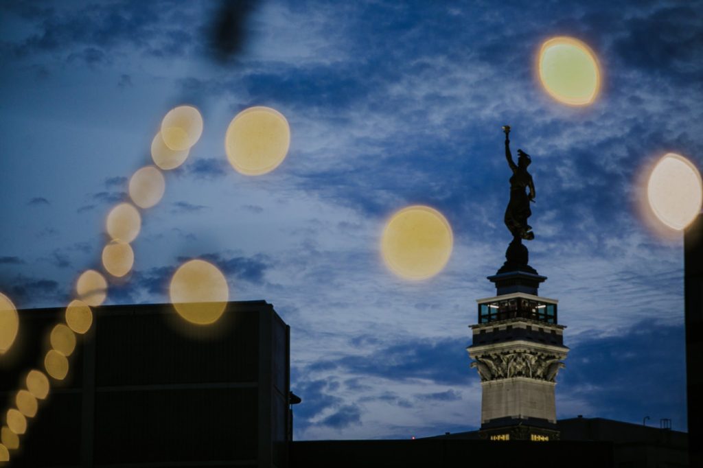 soldiers and sailors monument at blue hour surrounded by bokeh in downtown indianapolis photography