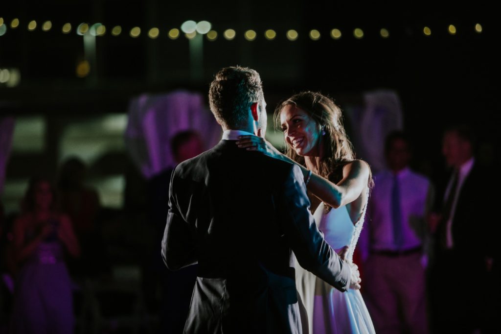 bride and groom dance on rooftop for Indy Photographer for Regions Tower wedding
