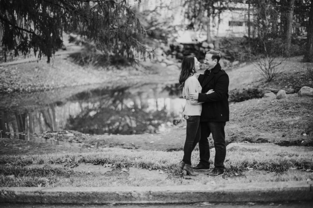 man and woman kiss during butler university portrait session