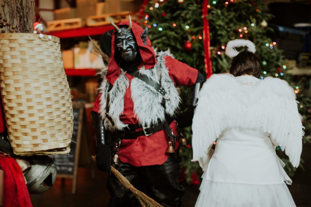 krampus walks through scarlet lane brewery at this Indianapolis Brewery Event Photography