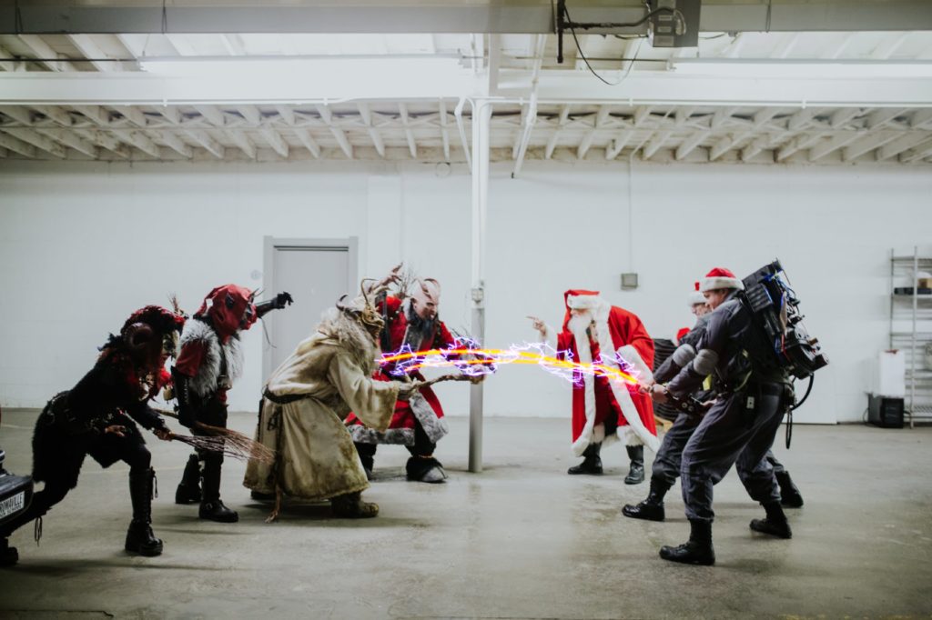 ghostbusters and santa fight krampus together at this herst with scarlet lane brewing company logo on back at this Indianapolis Brewery Event Photography