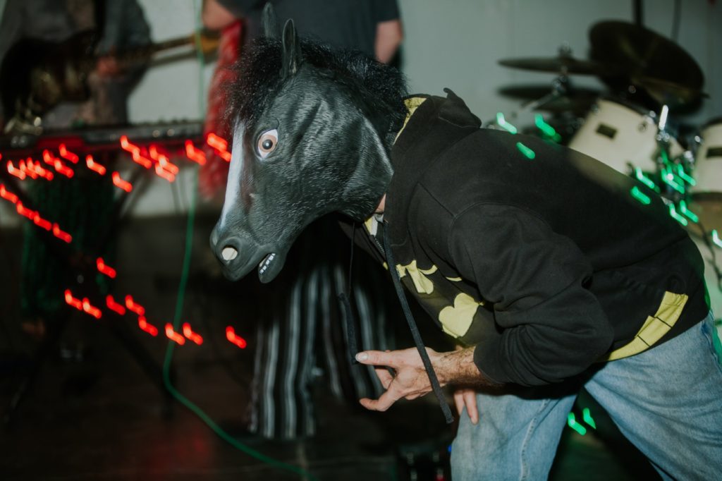 horse man dances to music at scarlet lane brewing company