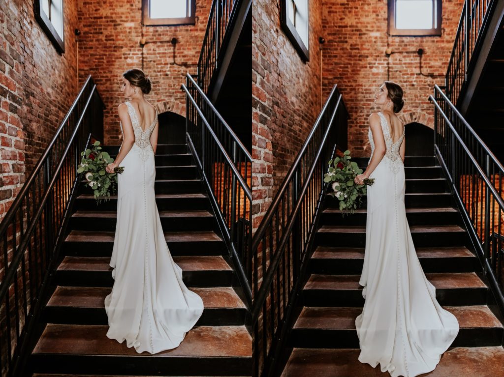 train of bride's dress displayed on stairs of a canal 337 wedding