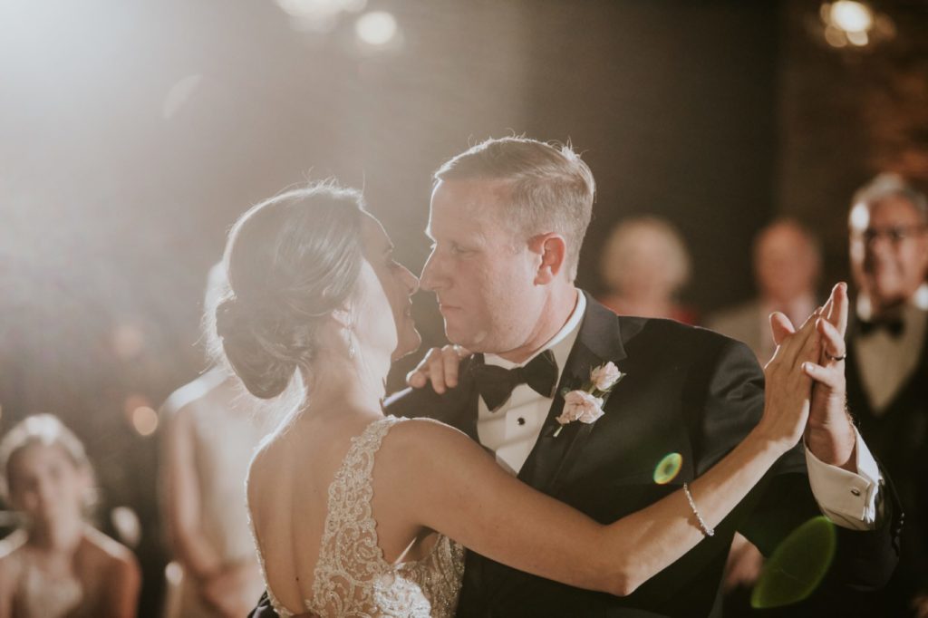 bride and groom share first dance at a canal 337 wedding
