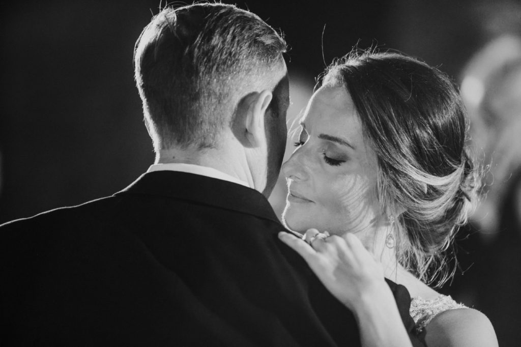 black and white photo of bride and groom's first dance at a canal 337 wedding