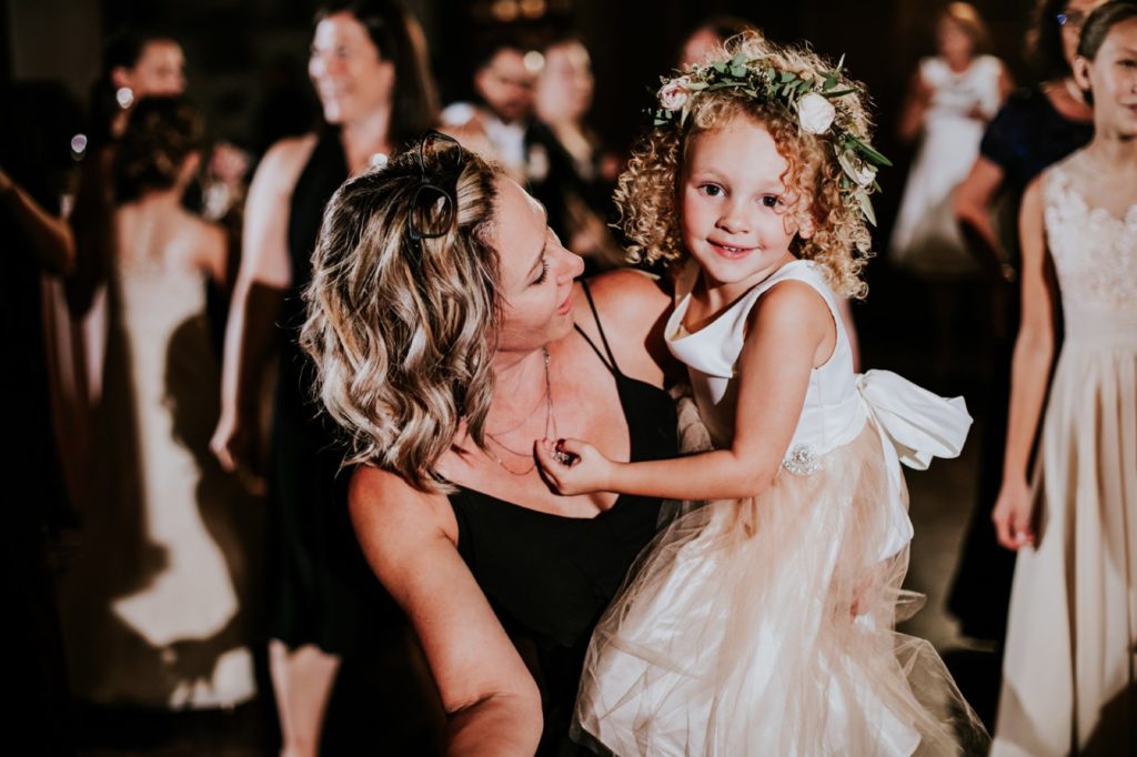flower girl dances with mom at canal 337 wedding