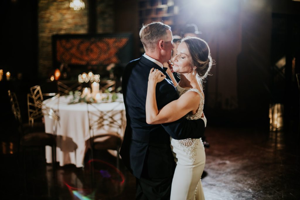 bride and groom dance together during open dancing at a canal 337 wedding