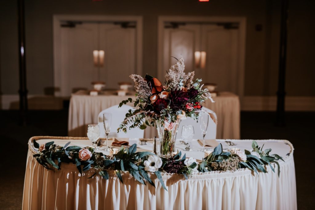 sweetheart table with flowers for Bel Air Kokomo Wedding