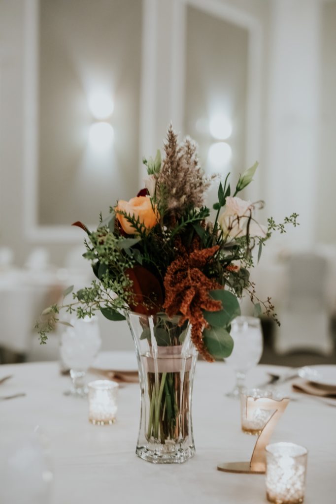 vase with flowers on table for Bel Air Kokomo Wedding