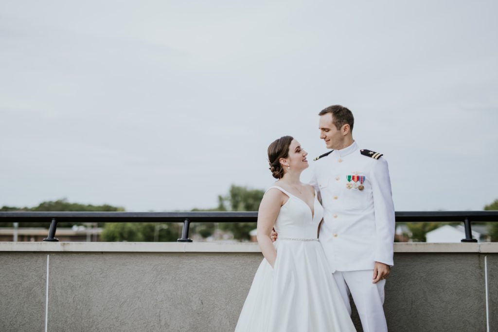 bride and groom standing on balcony for Bel Air Kokomo Wedding