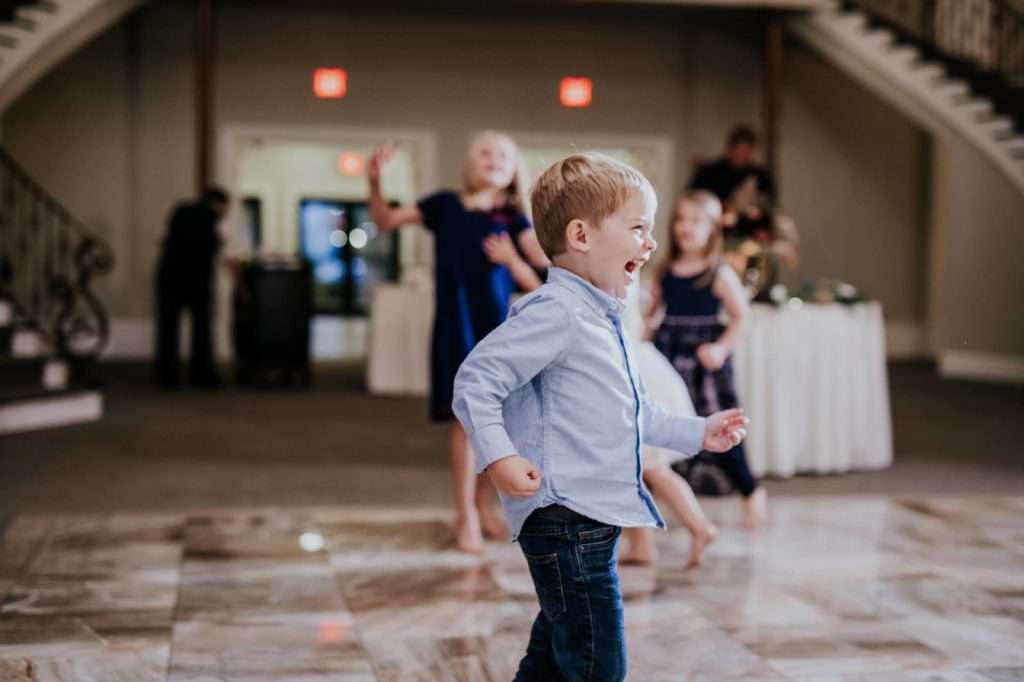 small boy dances at Bel Air Kokomo Wedding