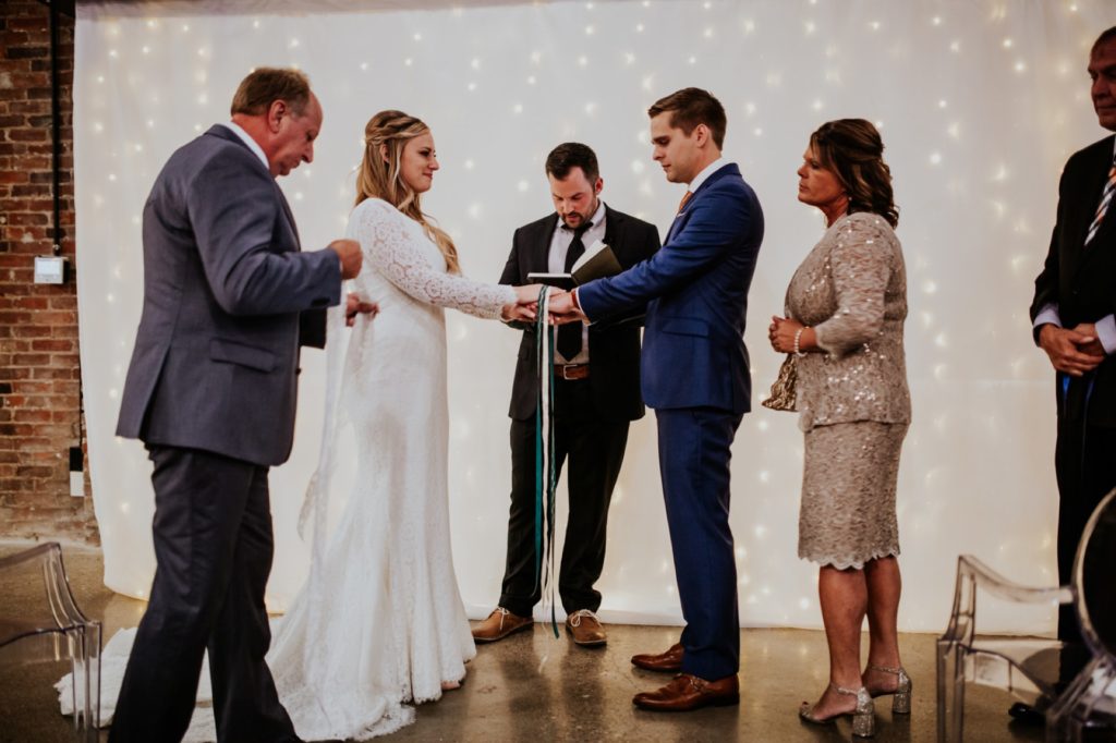 knot tying ceremony in a VisionLoft Wedding