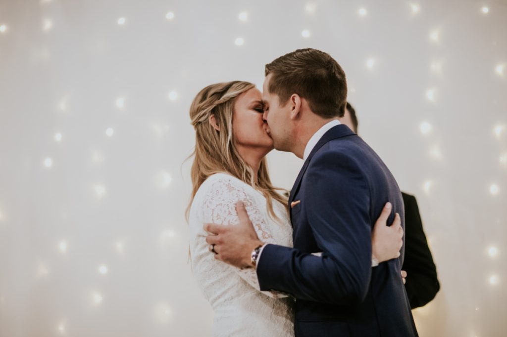 close up of first kiss at a VisionLoft Wedding