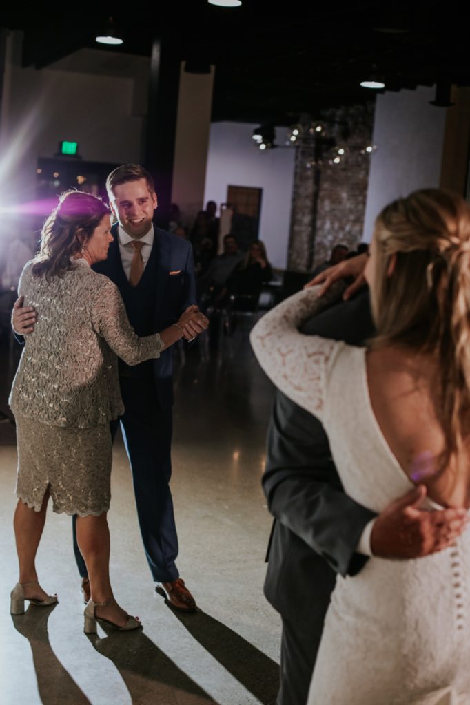 bride and groom dance with their parents at a VisionLoft Wedding