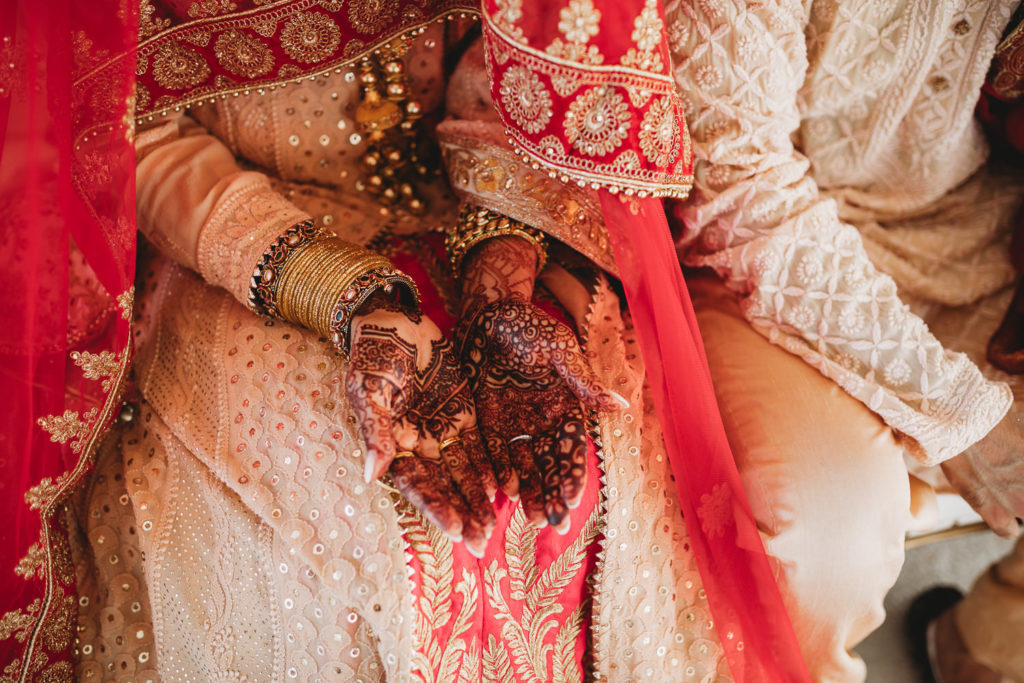henna tattoo on a bride's hands at her Coxhall Gardens wedding