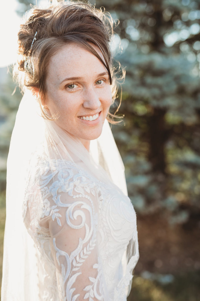 bride smiles at sunset during a Bash wedding
