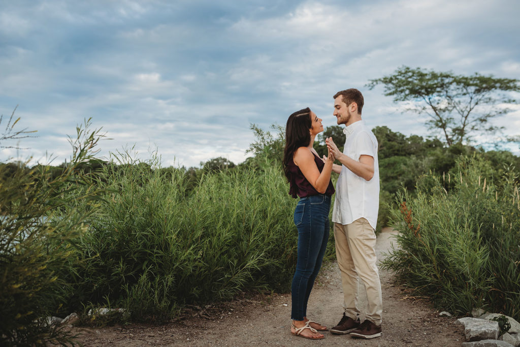 young couple dances during their Eagle Creek Reservoir Engagement