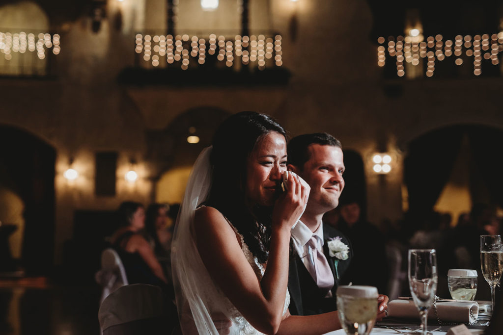 close up shot of bride crying during toasts at her Indiana Roof Ballroom wedding