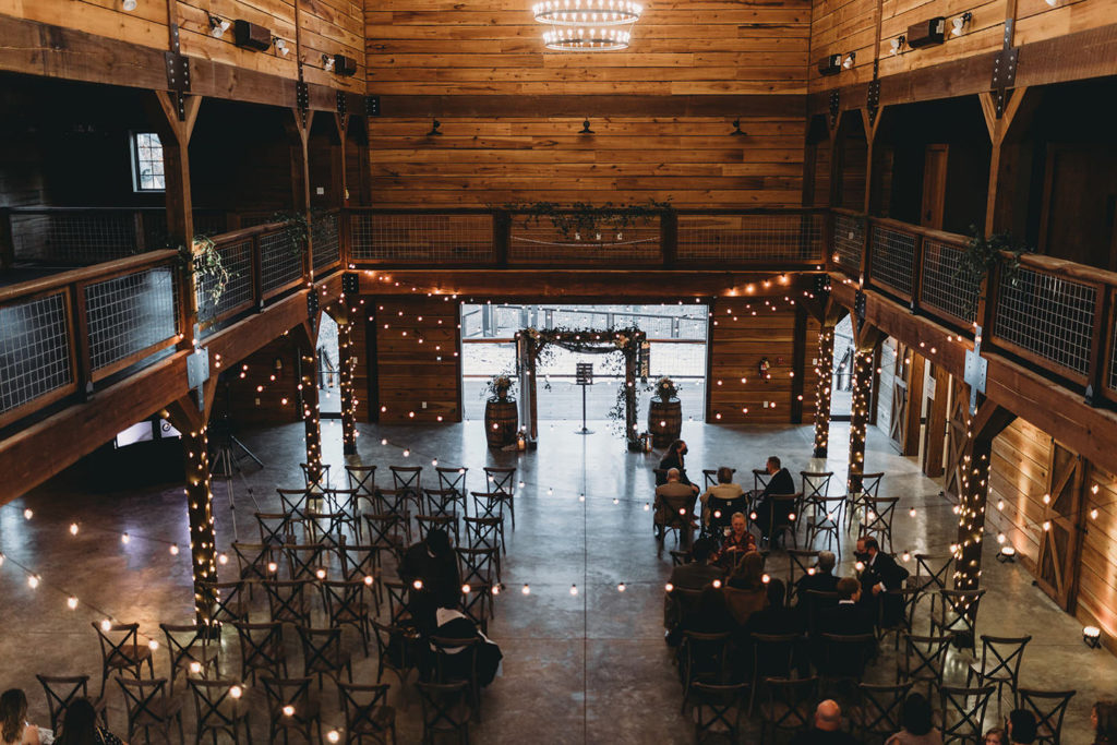 wide shot of ceremony location at a 3 Fat Labs wedding from the balcony above