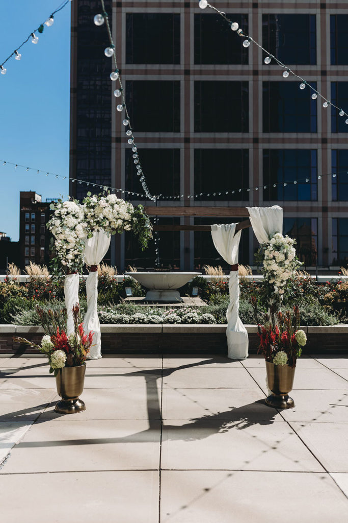 flowers and arches set up for a Regions Tower Wedding Celebration