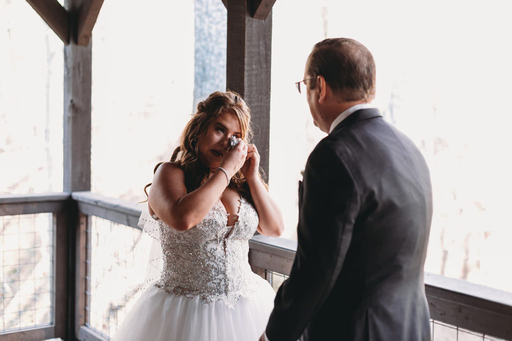 bride cries after seeing her dad for the first time during her 3 Fat Labs wedding