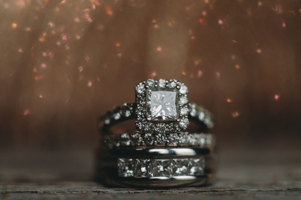 wedding ring with lots of bokeh behind it at a Franklin Barn Wedding