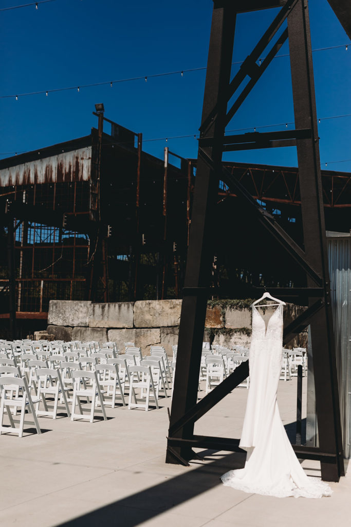 wedding dress hanging outside at a woolery mill wedding