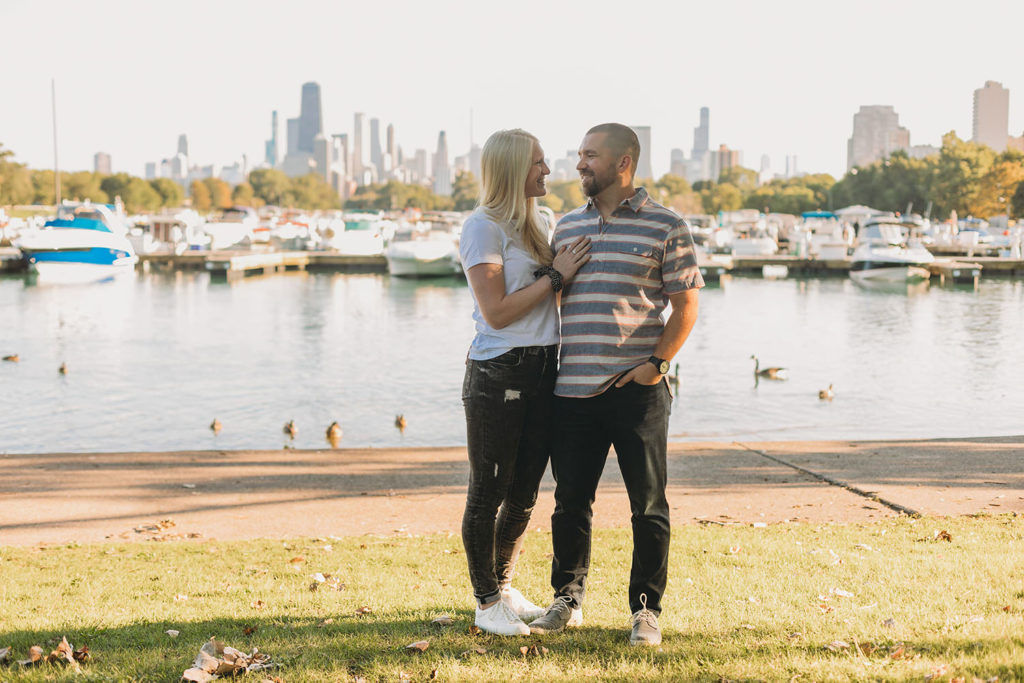 man and woman stand in front of harbor in chicago