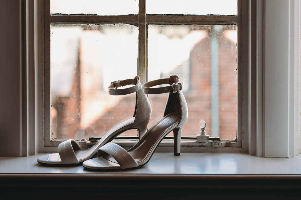 heels in window on the sill before bluffs wedding