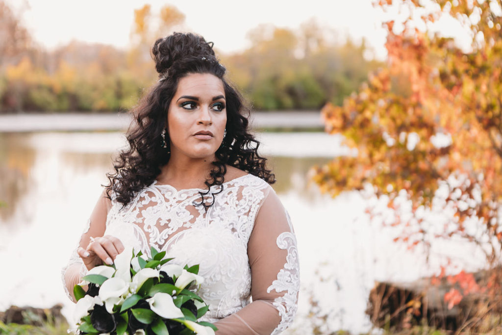 bride in front of st. joseph river before a ceruti wedding