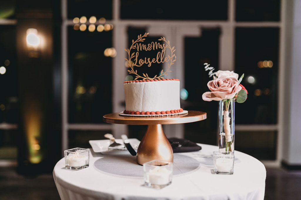 cake illuminated by flash at bluffs wedding