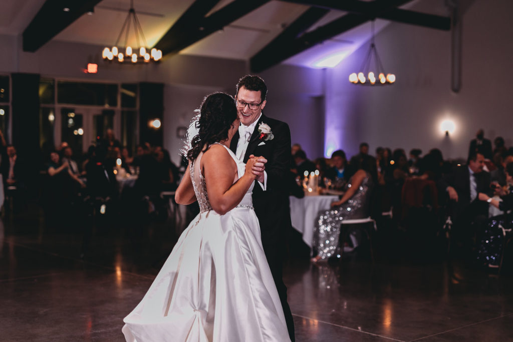 uplighting and bride and groom first dance at bluffs wedding