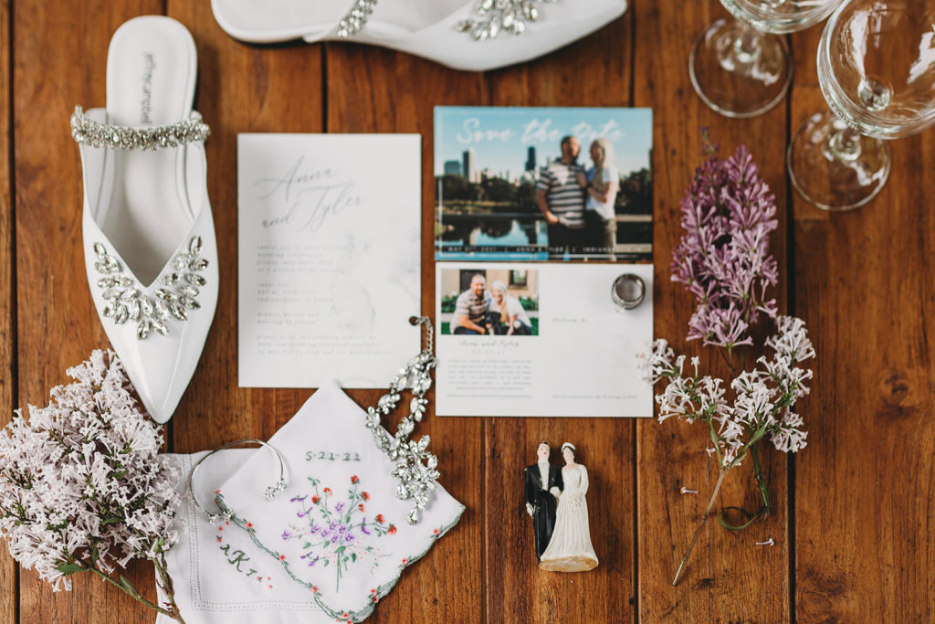 paper and wood and shoes and floral for an indy canal wedding